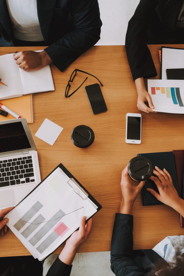 Top View of Business People on Meeting in Office.