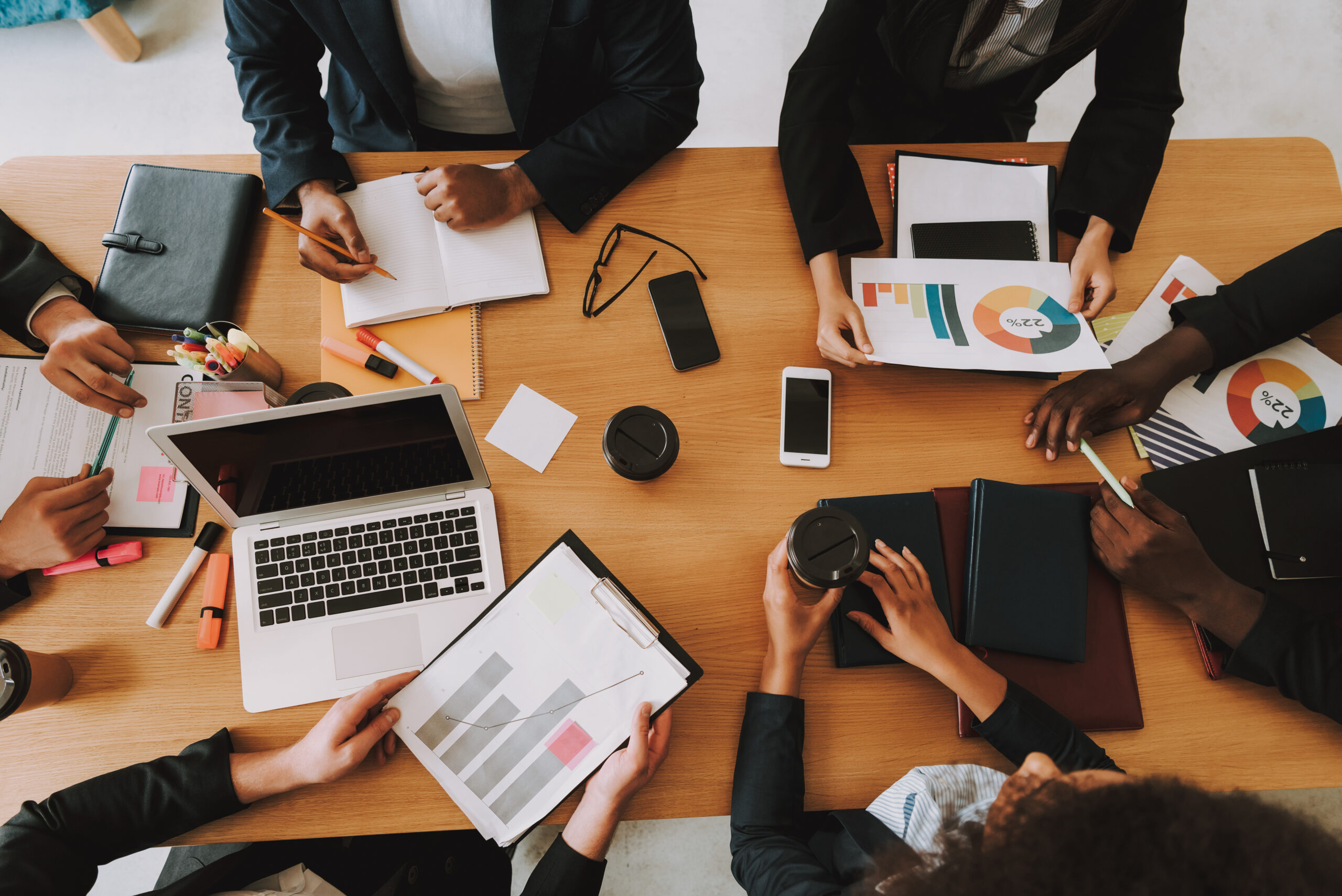 Top View of Business People on Meeting in Office.